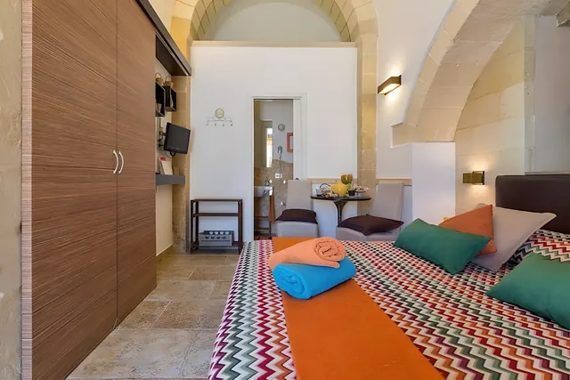 Suite Psema, camera Alithia, arco in pietra leccese – Le Dimore di Hanqorias, Muro Leccese